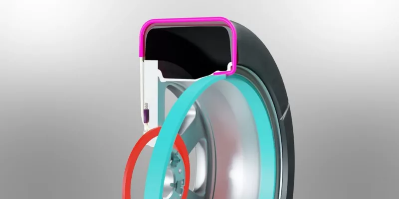 Snow chain-integrated tire